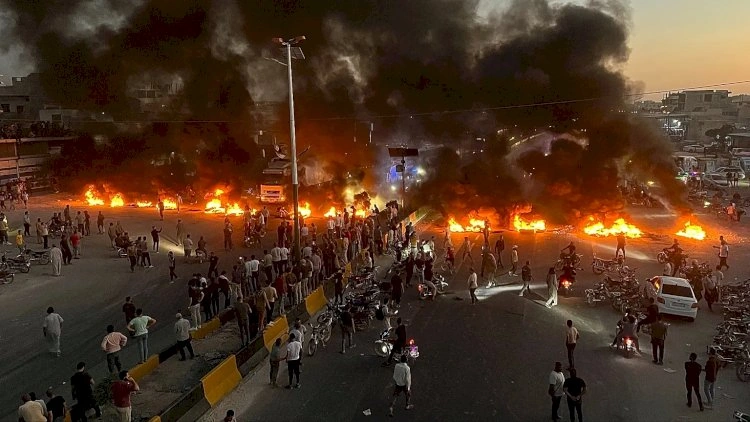 Suriyalılar Əsədi istəyir